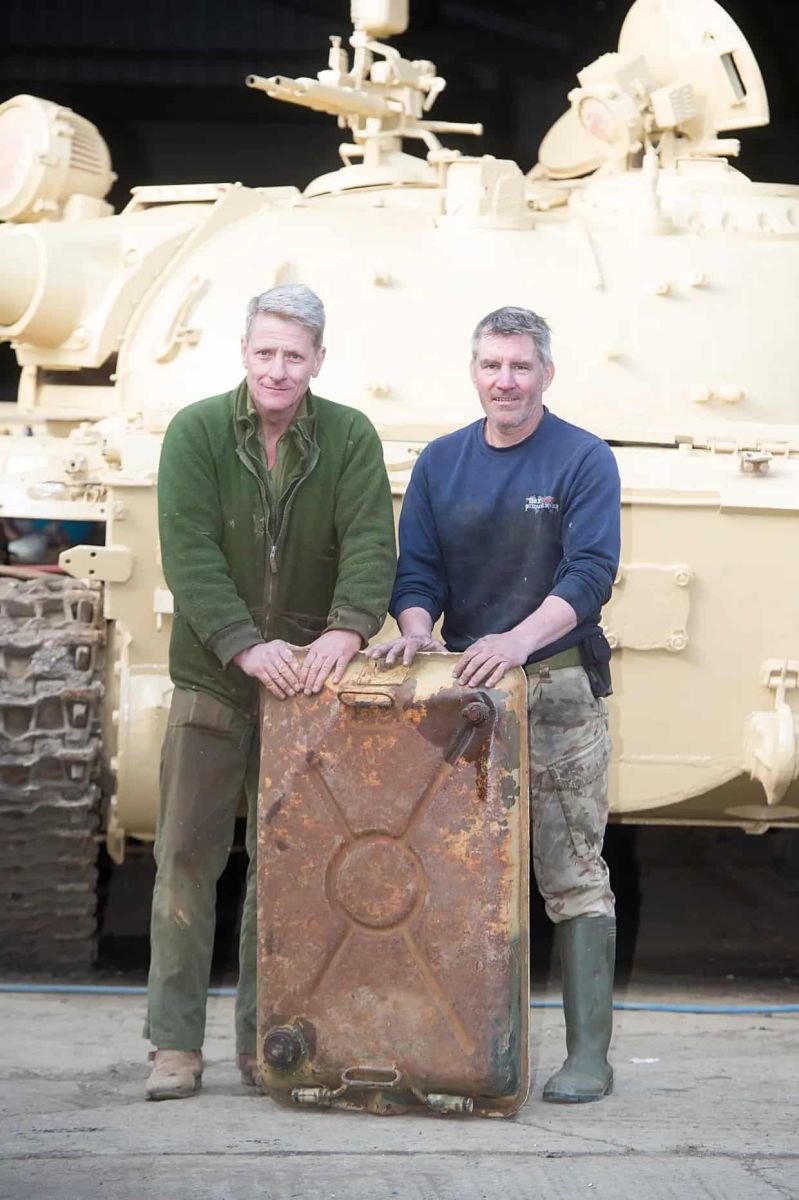 Men who found 5 gold bars in a tank