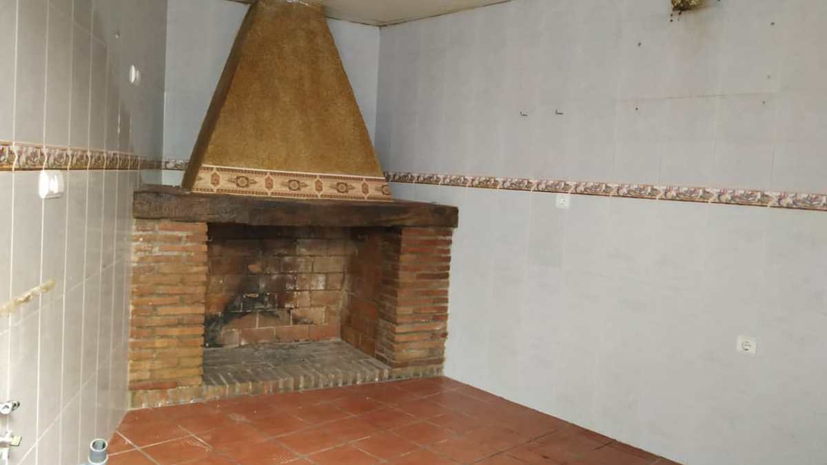 Chimenea de la casa en venta de CaixaBank