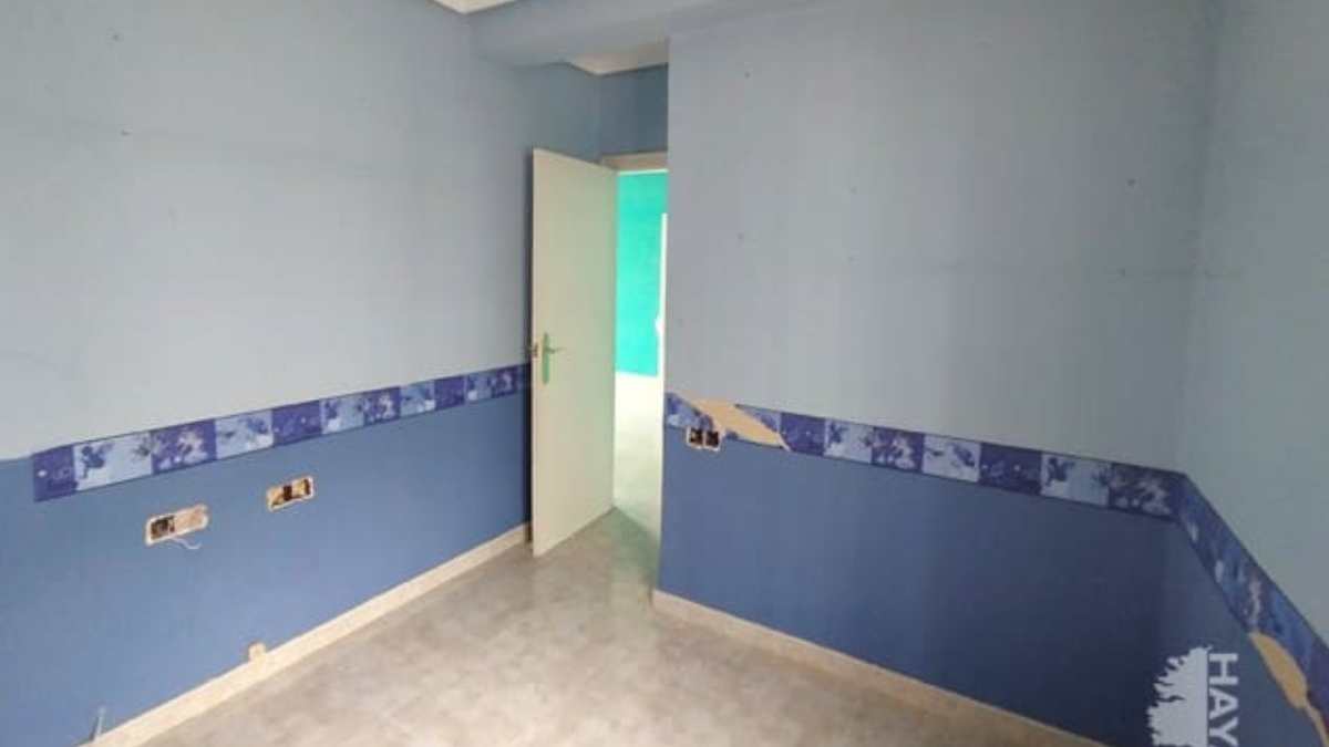 Dormitorio del piso en venta de CaixaBank en Valencia | Haya Inmobiliaria