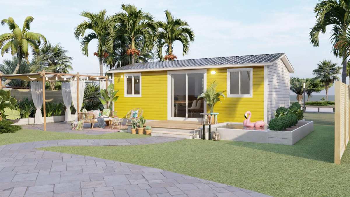 Fachada casa prefabricada en color amarillo